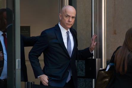 a man walking out of a door