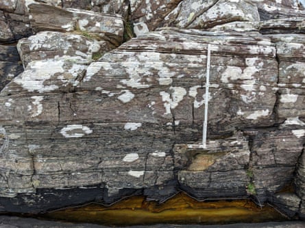 Rock showing layers including a measure