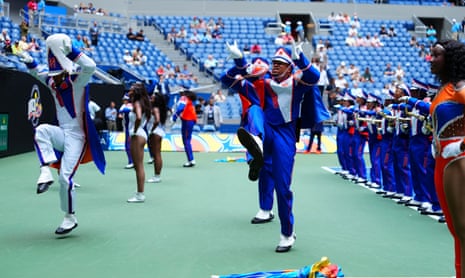 The Morgan State University marching band entertain fans on Arthur Ashe Court before play.