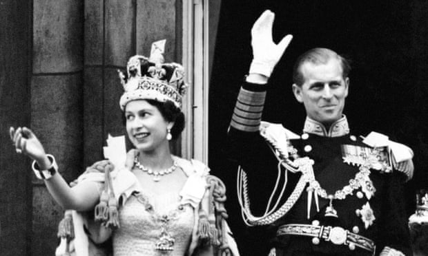 The Queen, wearing the Imperial State Crown, and the Duke of Edinburgh at Buckingham Palace after the coronation, 1953.