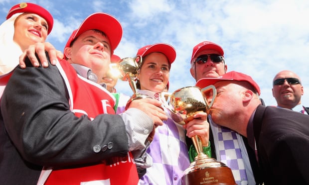 Strapper Stephen Payne (left) and his jockey sister Michelle Payne celebrate winning the Melbourne Cup