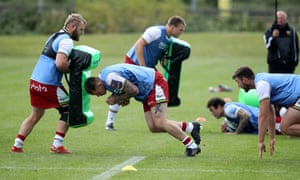 Teimana Harrison charges into a tackle bag during a Northampton Saints training session at Franklin’s Gardens in July.
