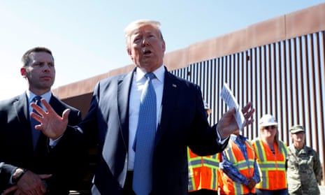 Trump visits a section of the U.S.-Mexico border wall in Otay Mesa, California.