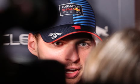 Max Verstappen speaks to a reporter at the Jeddah Corniche Circuit paddock on Wednesday