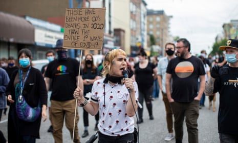 Activists with the Drug User Liberation Front march in a protest demanding the legalization and regulation of drugs in Vancouver, British Columbia.
