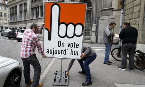 A sign reading ‘vote today’ in Fribourg. Switzerland has held about 300 referendums since 1848.
