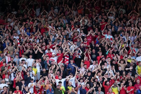 Nottingham Forest fans celebrate staying in the Premier League.