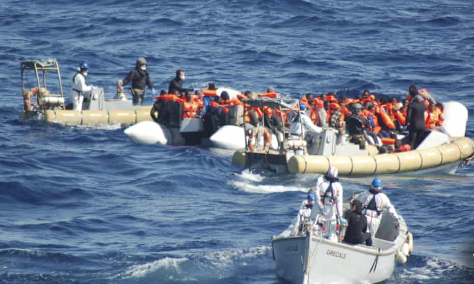 People on a dinghy off the coast of the Italian island of Lampedusa on Wednesday.