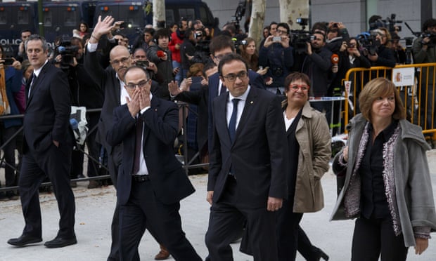 Former members of the Catalan government arrive at Spain’s national court in Madrid.