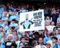 Manchester City fans with a banner that says: 'Our hero forever you made us great and changed football' at the Etihad Stadium