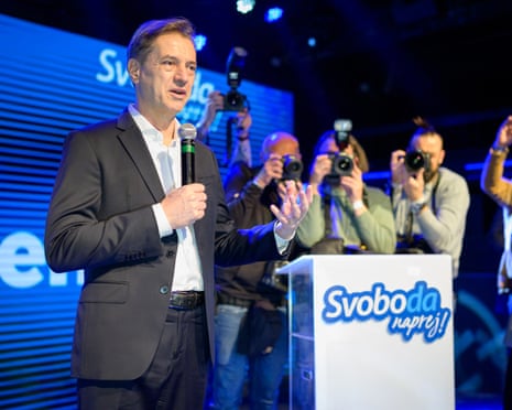 Slovenia’s prime minister Robert Golob (L) addresses the supporters of Gibanje Svoboda (The Freedom Movement) after the general elections results are released in Ljubljana, Slovenia.