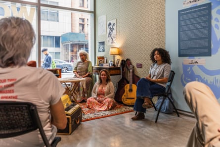 People sit in an exhibit room