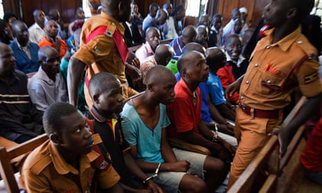 Forty-seven men being tried for sexual violence against women and girls attend a special session at the Kampala High Court in Uganda