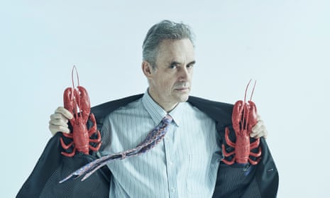 Jordan Peterson holding two lobsters
