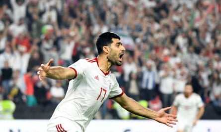 Mehdi Taremi celebrates after scoring during the 2019 Asian Cup quarter-final against China in Abu Dhabi.