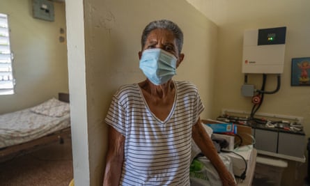 Rosalina Marrero in her solar-powered residence in Barrio Jobos in Guayama.