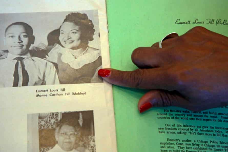 Deborah Watts of Minneapolis, points out a widely seen 1950s photograph of her cousin Emmett Till and his mother Mamie Till Mobley, during a visit to Jackson, Miss., Thursday, Aug. 27, 2015.