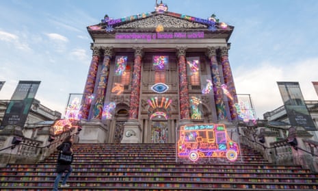 Brave New World exhibition on facade of Tate Britain Winter Commission, a technicolour installation of swirling coloured neon lights referencing mythology, Bollywood, radical feminism, political activism and family memories