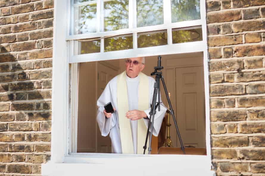 16 April: Father Rayner Wakeling, of St Silas church in King’s Cross, prepares to deliver a service to his parishioners via Facebook from his home