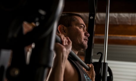 Jason Whiter is legally blind and has has constructed a home gym and has been working out with his PT - Marco Monteiro- over skype. He plans on competing in professional bodybuilding championships in December. Photogrpah by Christopher Hopkins for The Guardian
