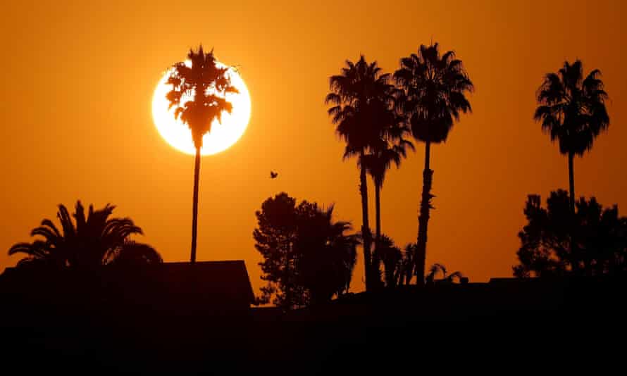 The sun rises over a neighborhood in Encinitas, California, amid a heatwave last year.
