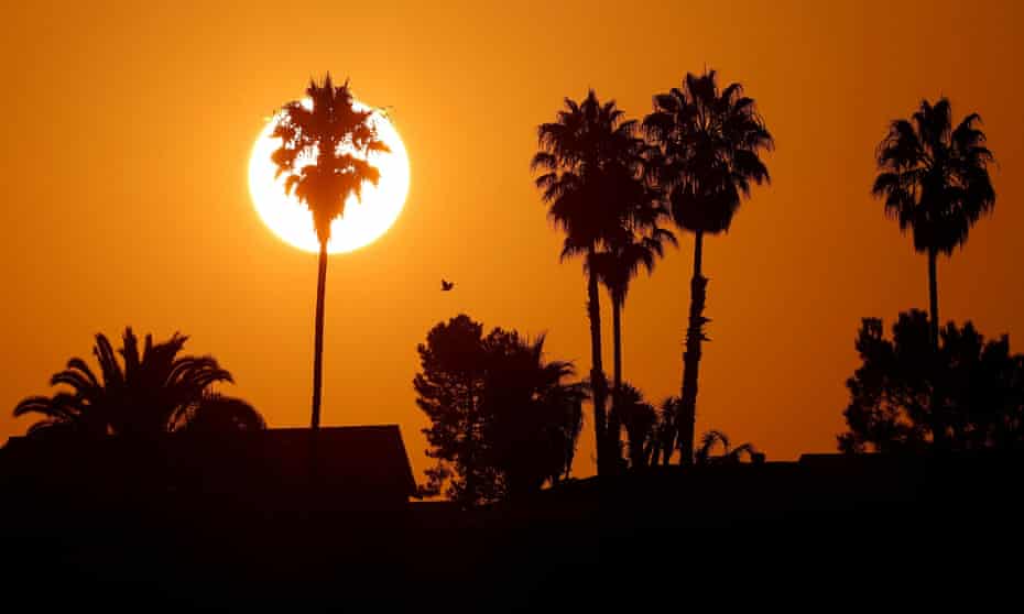 The sun rises over a neighborhood in Encinitas, California, amid a heatwave last year. 