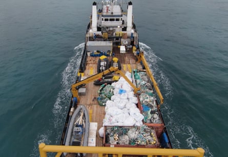 The M/V Imua, 180ft supply vessel, as it steams into port in Honolulu carrying 94,472lb of marine debris on deck.