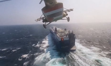 A Houthis-operated helicopter flying over the cargo ship Galaxy Leader