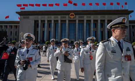Chinese military delegates outside the Great Hall of the People after the closing session of the Party Congress