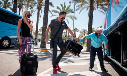 Tourists travelling with Tui in Mallorca in June. Tui has now cancelled holidays to Spain for its British customers up to 9 August.