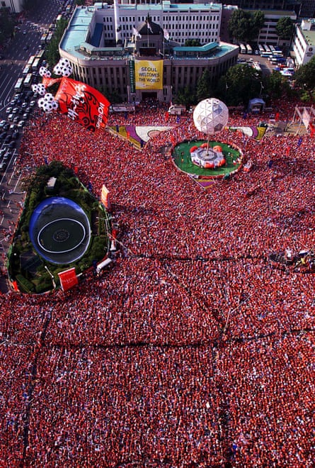 The streets of Seoul were turned red also as tens of thousands of fans watched the match on big screens.