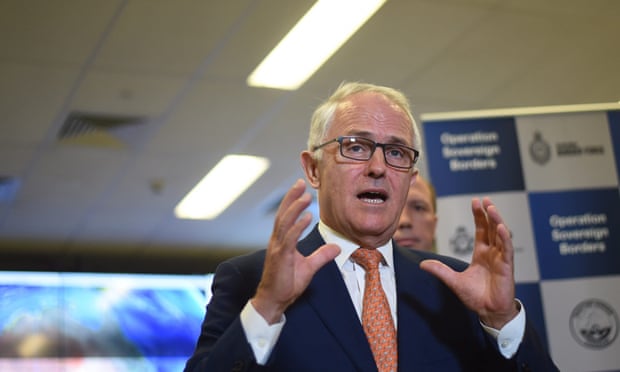  Malcolm Turnbull speaks to officials at the Australian Maritime Border Command Centre in Canberra on Sunday. Photograph: Lukas Coch/EPA