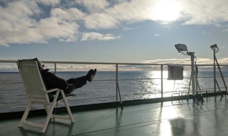 One of only two fellow passengers enjoying a sunny afternoon on board the cargo ship.