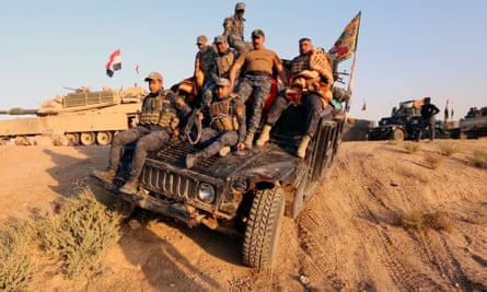 Iraqi forces enter Kirkuk on Monday.