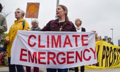 Protesters holding banner reading 'Climate emergency'