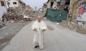 Pope Francis prays in front of quake ruins in Amatrice