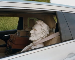 Bust of Lincoln in the back seat of a car, as if he were a passenger