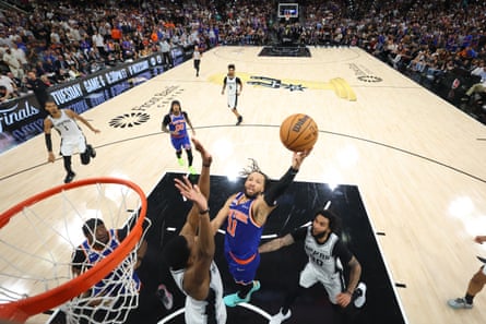 The Knicks’ Jalen Brunson drives to nan handbasket arsenic Spurs guardant Julian Champagnie defends during nan first half of Saturday’s game.