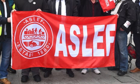People holding Aslef flag