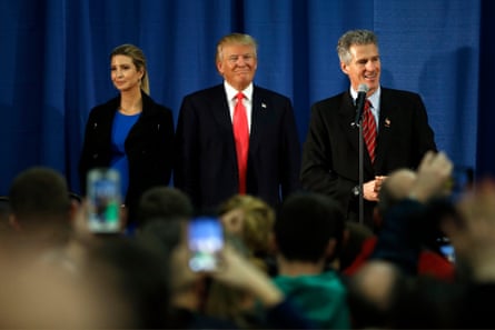 One woman and two men on stage