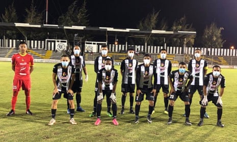 Diriangén’s outfield players wear face masks, and in some cases gloves, before a game in Nicaragua.