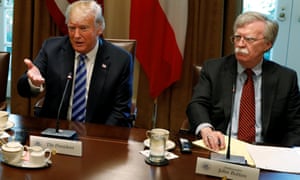 President Donald Trump with the US national security adviser, John Bolton