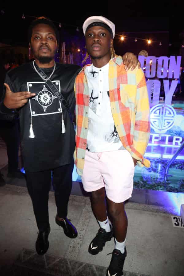 Fireboy DML (right) with Olamide in Los Angeles in June.