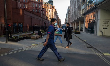 Sebastian is a fast walker. Here, he strides out to the Grafton Way building at the hospital to check on patients there