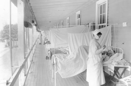 A nurse cares for a patient in the influenza ward of Walter Reed hospital in Washington in 1918.