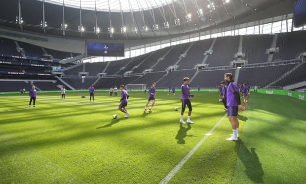 Spurs players take training inside the club’s new stadium for the first time.