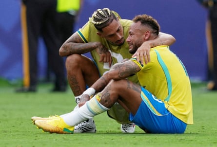 Brazil’s Neymar is consoled by Raphinha after their side were eliminated from the World Cup by Norway.