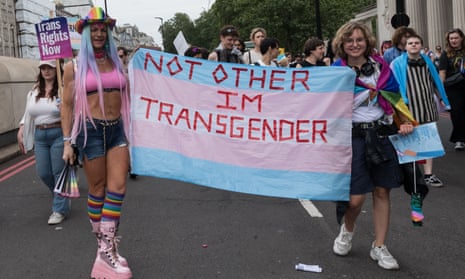 Transgender people and supporters march through central London at a protest for transgender freedom and equality in July.