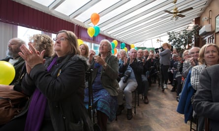 Supporters applaud as Plaid Cymru leader Leanne Wood speaks at her party’s campaign launch in Bangor.