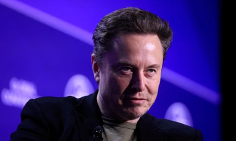 Elon Musk, Chief Executive Officer of SpaceX and Tesla and owner of X looks at the Milken Conference 2024 at The Beverly Hilton in Beverly Hills, California, US.